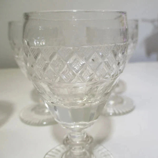 Georgian or Regency Set of Four Wine Glasses Panel Cut and Diamond Point with a Star Cut Foot