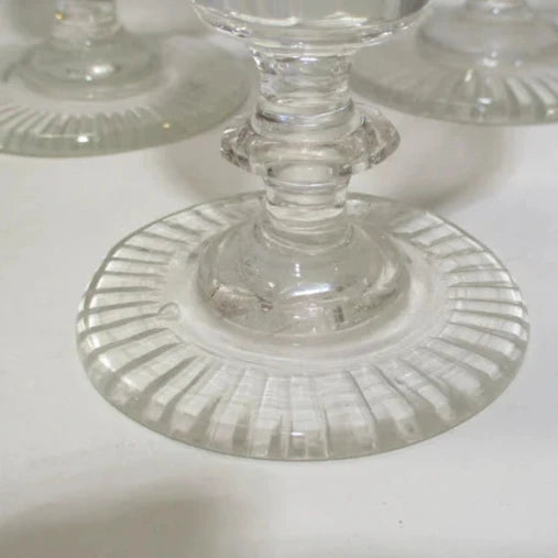 Georgian or Regency Set of Four Wine Glasses Panel Cut and Diamond Point with a Star Cut Foot