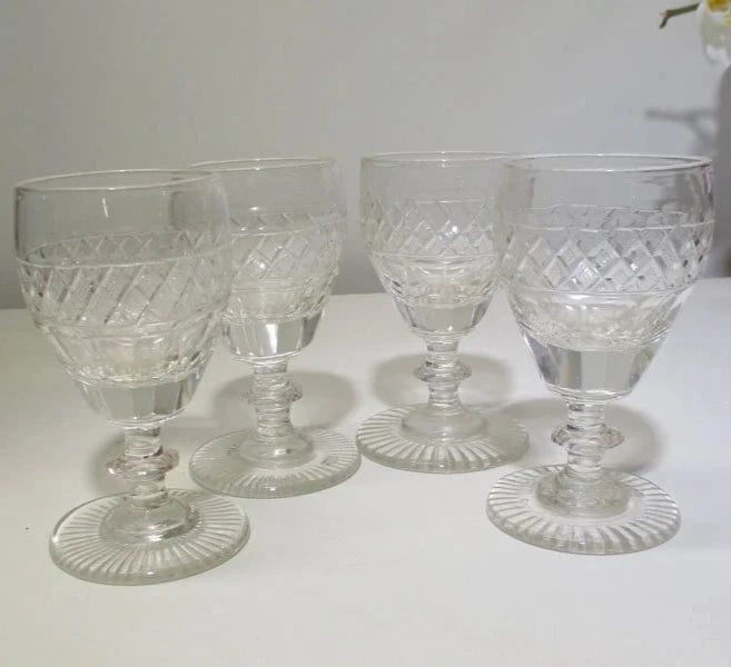 Georgian or Regency Set of Four Wine Glasses Panel Cut and Diamond Point with a Star Cut Foot
