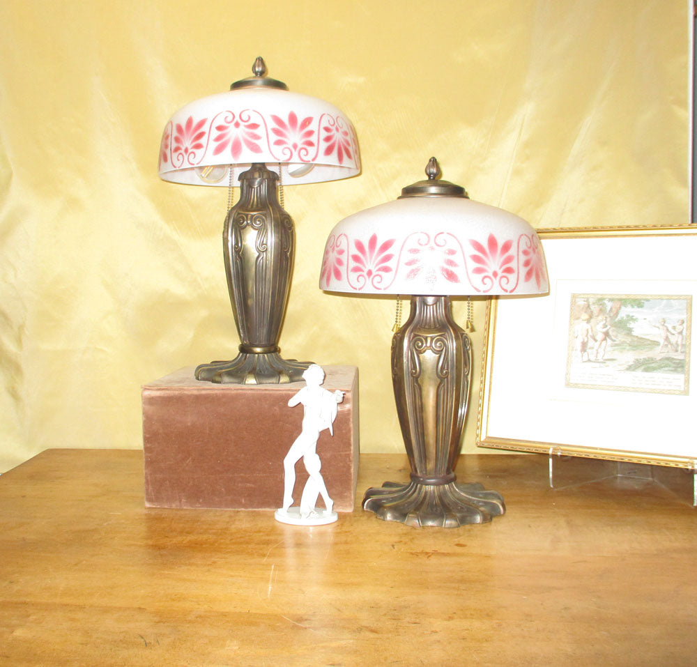 Matched Pair of Pittsburgh Lamps with obverse painted glass shades and brass bases.