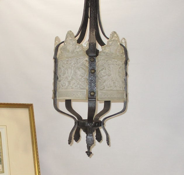 Iron and Glass hanging hall light with Medieval Knights embossed in glass panels.