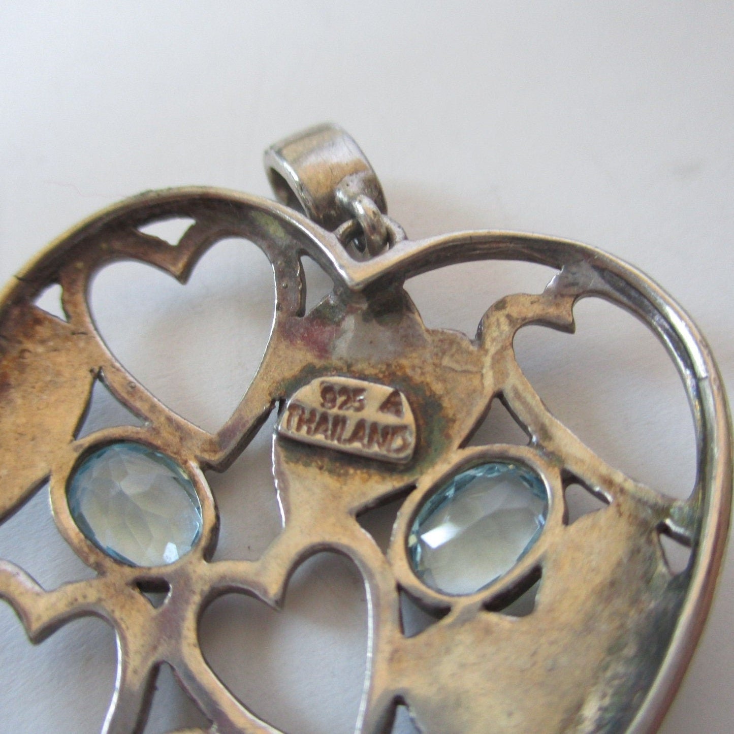 Gr 110 Art Deco Sterling Silver, Marcasite and Blue Topaz Stylized Heart Pendant