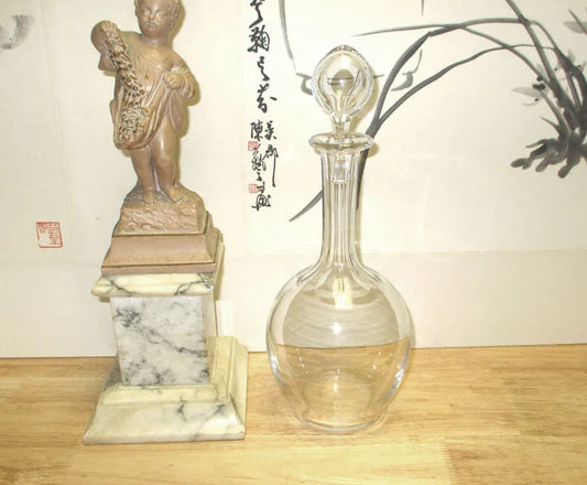 Baccarat Liqueur Decanter with original trapped bubble stopper.